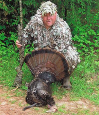 Lenny and wild turkey harvested with Spider Blind
